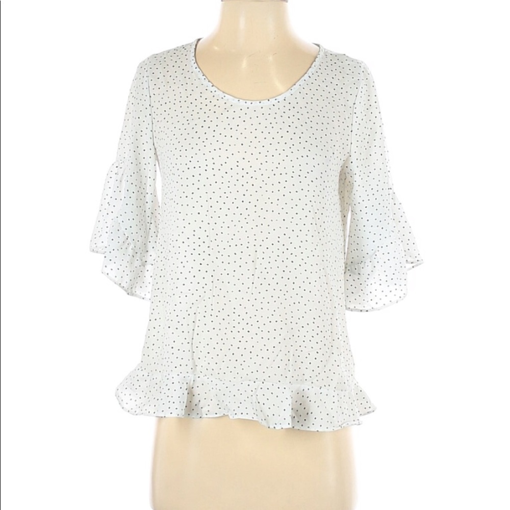 Sienna Sky ruffle sleeve and hem polka dot blouse